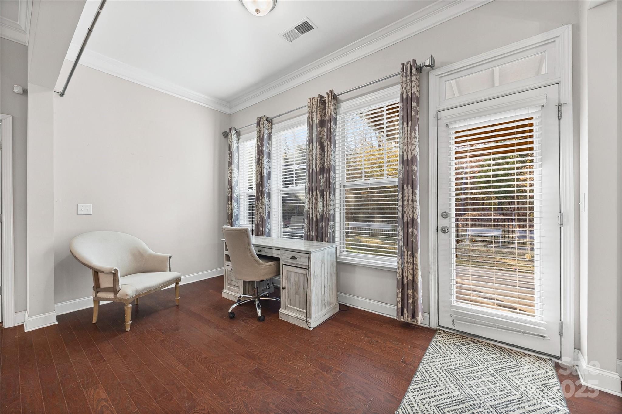 1541 Hedge Apple Road Clover, SC 29710 - Photo 22 of 48 a view of a workspace with furniture and a window
