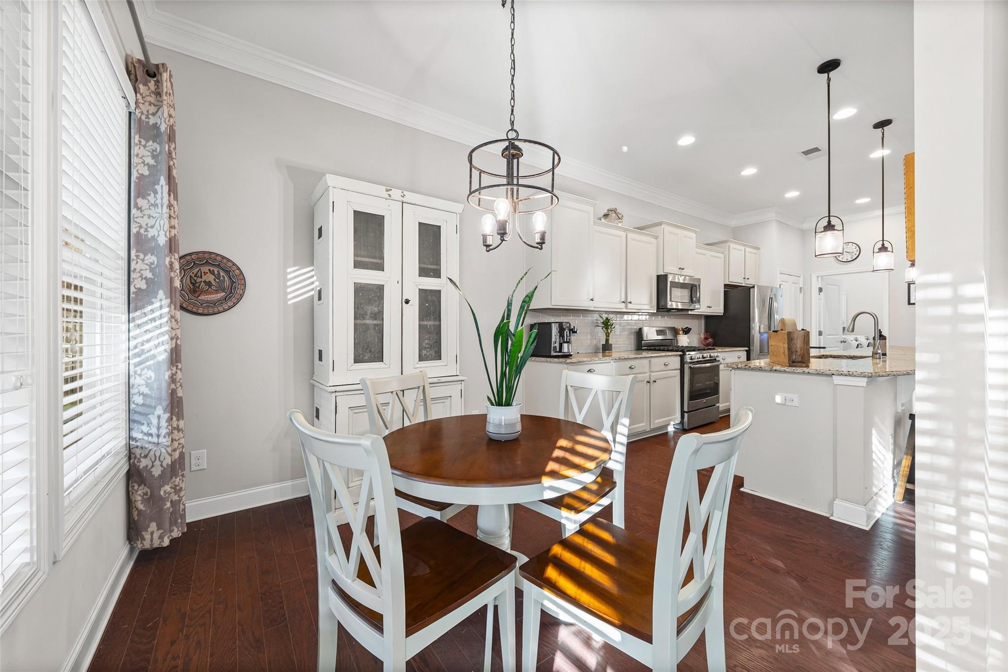 1541 Hedge Apple Road Clover, SC 29710 - Photo 23 of 48 a dining room with furniture and wooden floor