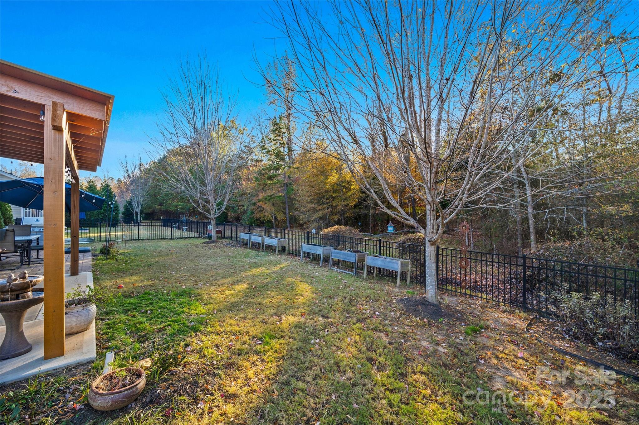 1541 Hedge Apple Road Clover, SC 29710 - Photo 36 of 48 a view of a backyard with a garden