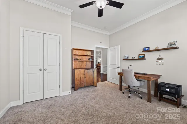 a view of a workspace with furniture