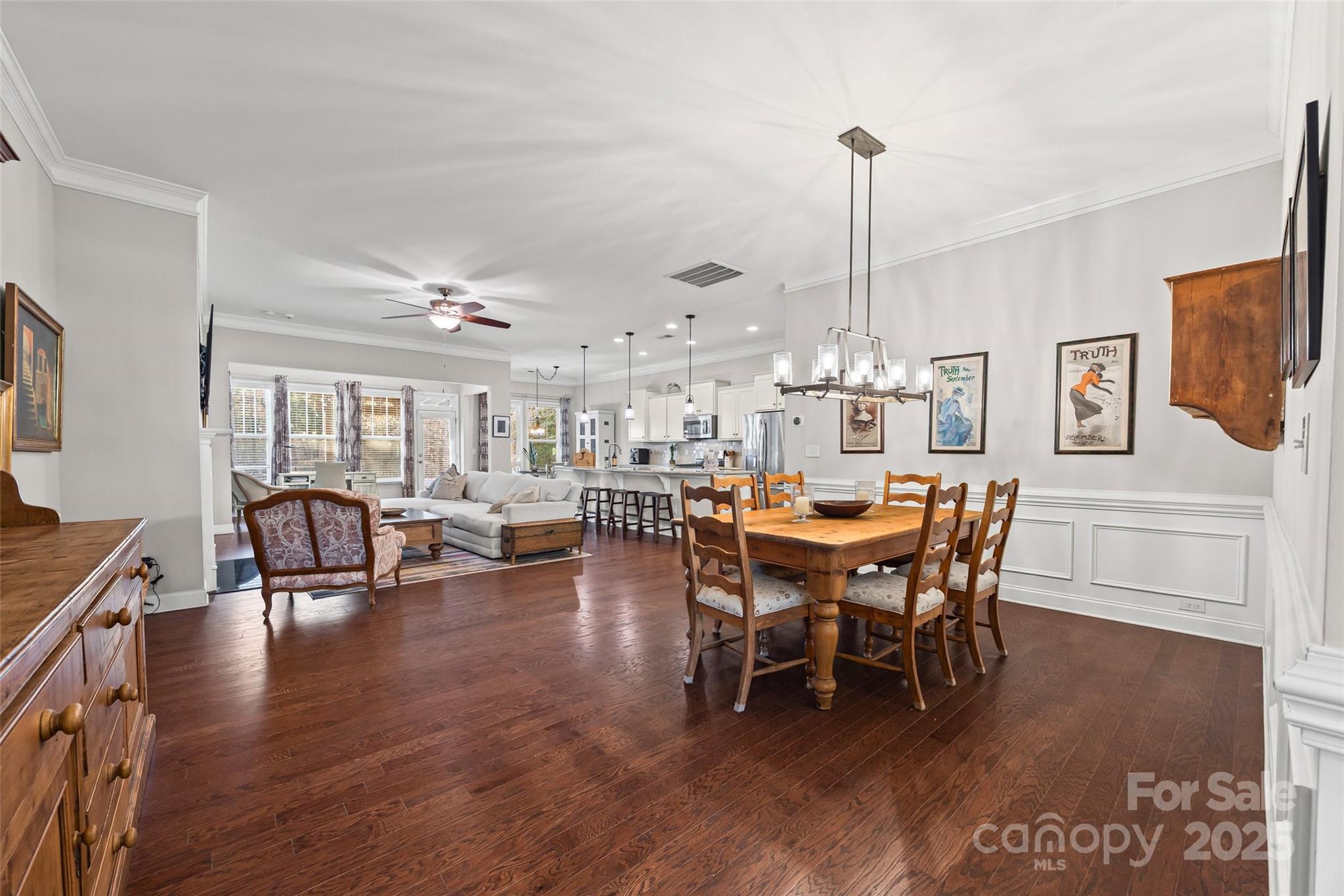 1541 Hedge Apple Road Clover, SC 29710 - Photo 10 of 48 a view of a dining room with furniture window and wooden floor