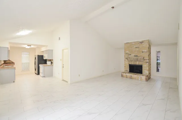 a view of a kitchen with a sink