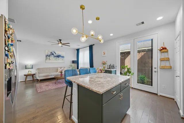 a living room with furniture and a table