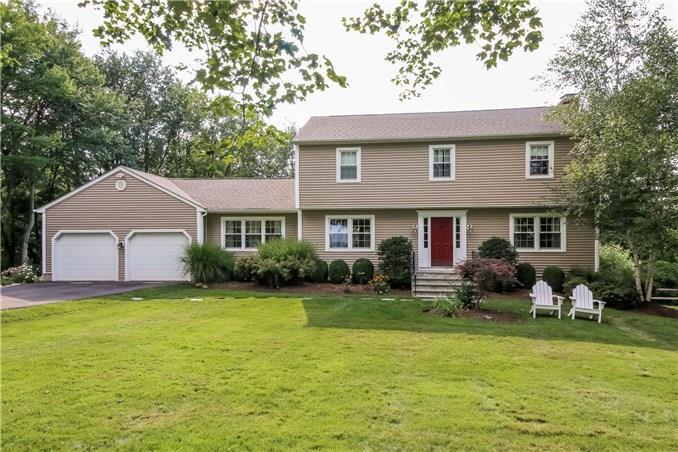 22 Valley View Road Newtown, CT 06470 - Photo 1 of 1 a front view of house with yard and green space