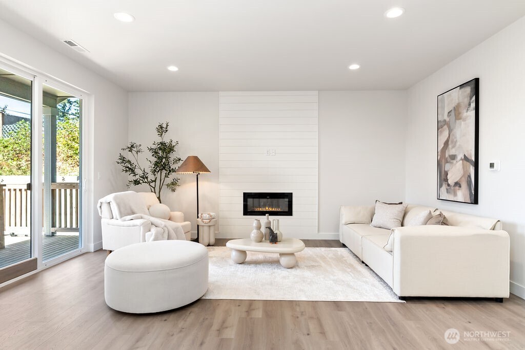 1720 South Tyler Street Tacoma, WA 98405 - Photo 5 of 14 a living room with furniture and a fireplace