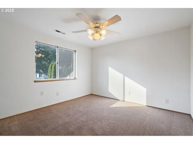 a view of an empty room with window