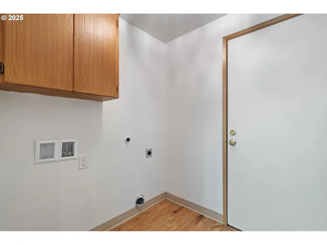 a view of small space with wooden floor