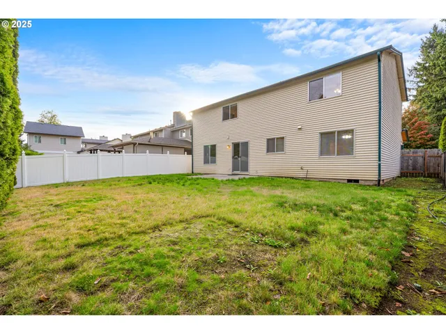 a view of yard with swimming pool