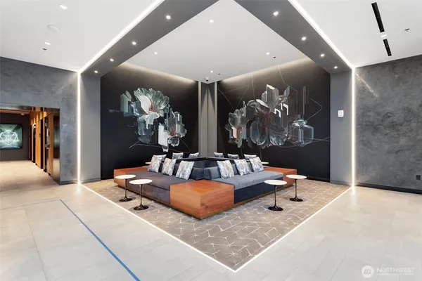 a living room with granite countertop furniture and chandelier