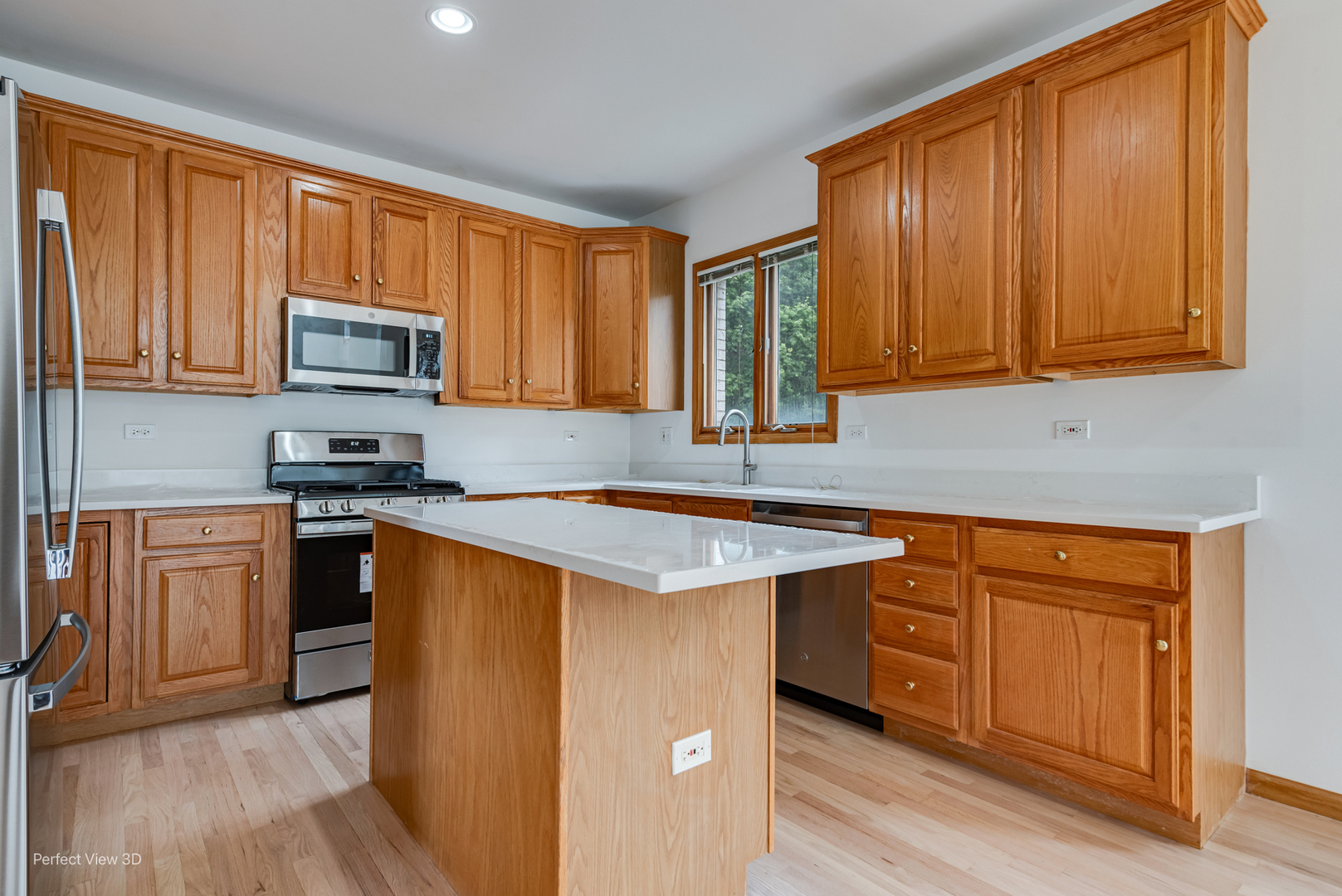 16W234 91st Street Burr Ridge, IL 60527 - Photo 11 of 31 a kitchen with stainless steel appliances granite countertop a stove a sink dishwasher and a microwave oven with cabinets