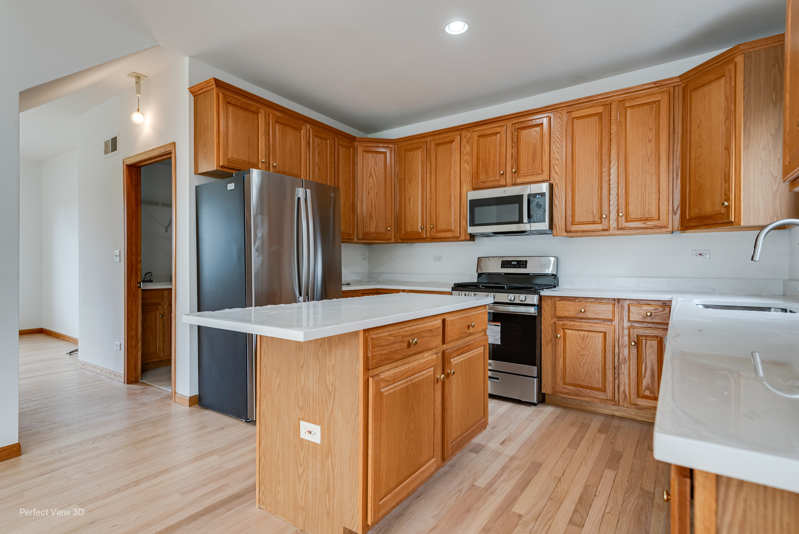 16W234 91st Street Burr Ridge, IL 60527 - Photo 12 of 31 a kitchen with stainless steel appliances granite countertop a refrigerator stove top oven and sink