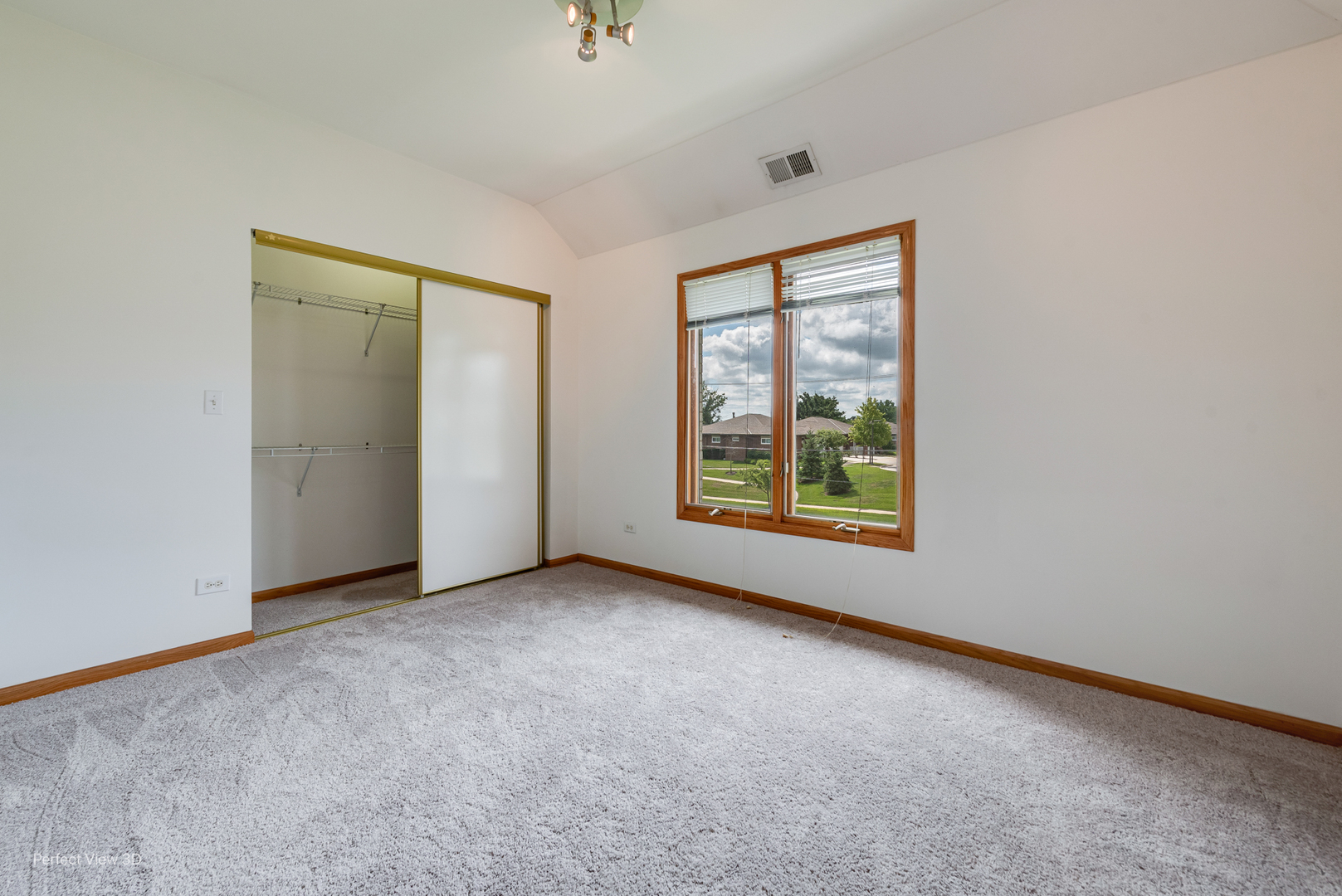 16W234 91st Street Burr Ridge, IL 60527 - Photo 22 of 31 an empty room with windows