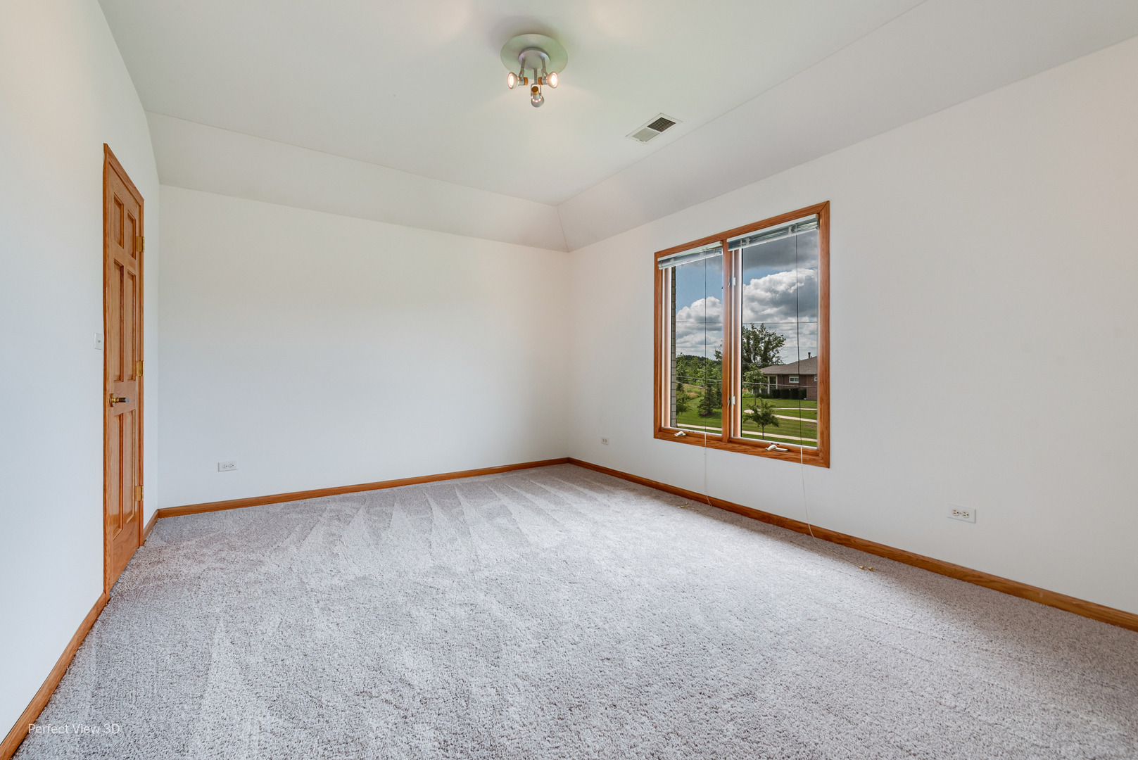 16W234 91st Street Burr Ridge, IL 60527 - Photo 23 of 31 a view of an empty room with a window