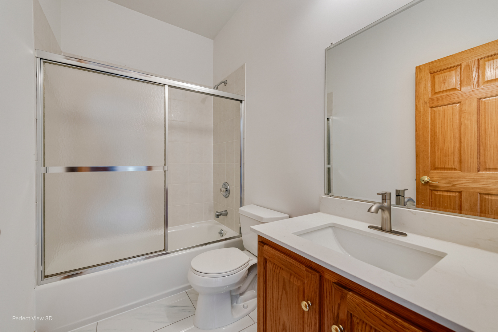 16W234 91st Street Burr Ridge, IL 60527 - Photo 25 of 31 a bathroom with a sink a toilet and shower