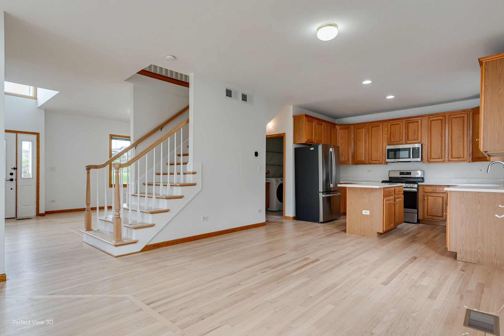 16W234 91st Street Burr Ridge, IL 60527 - Photo 9 of 31 a view of kitchen with stainless steel appliances kitchen island wooden cabinets and wooden floor