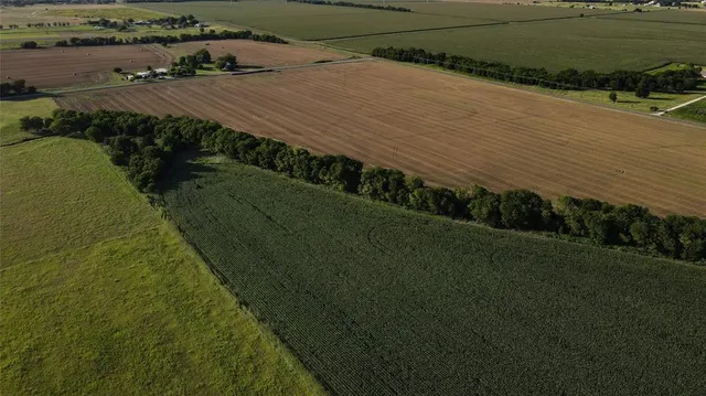 a view of a lake with a big yard