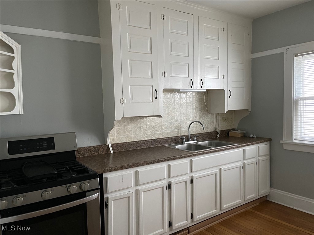 2176 Rexwood Road Cleveland, OH 44118 - Photo 3 of 45 Cook's Kitchen with Awesome Cabinets, Gas Oven/Range, Refrigerator, Stainless Steel Double Sink, Gorgeous Hardwood Floors ~