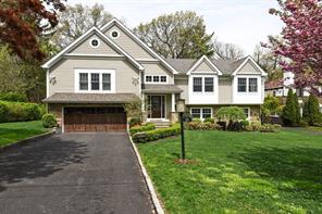 176 Lyncroft Road New Rochelle, NY 10804 - Photo 1 of 1 a front view of a house with a garden