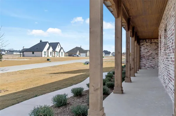 a view of a balcony with ocean view