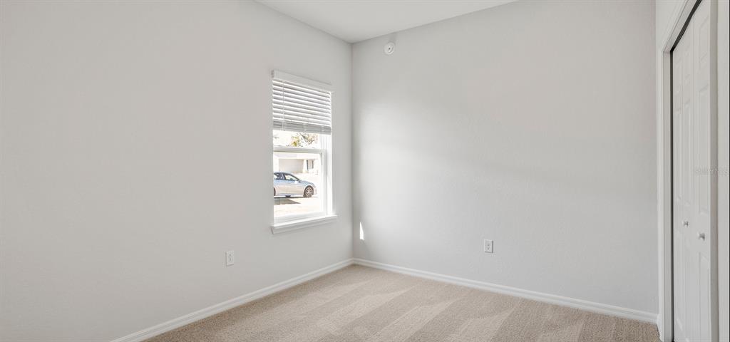 7550 Southwest 107th Lane Ocala, FL 34476 - Photo 11 of 22 an empty room with windows