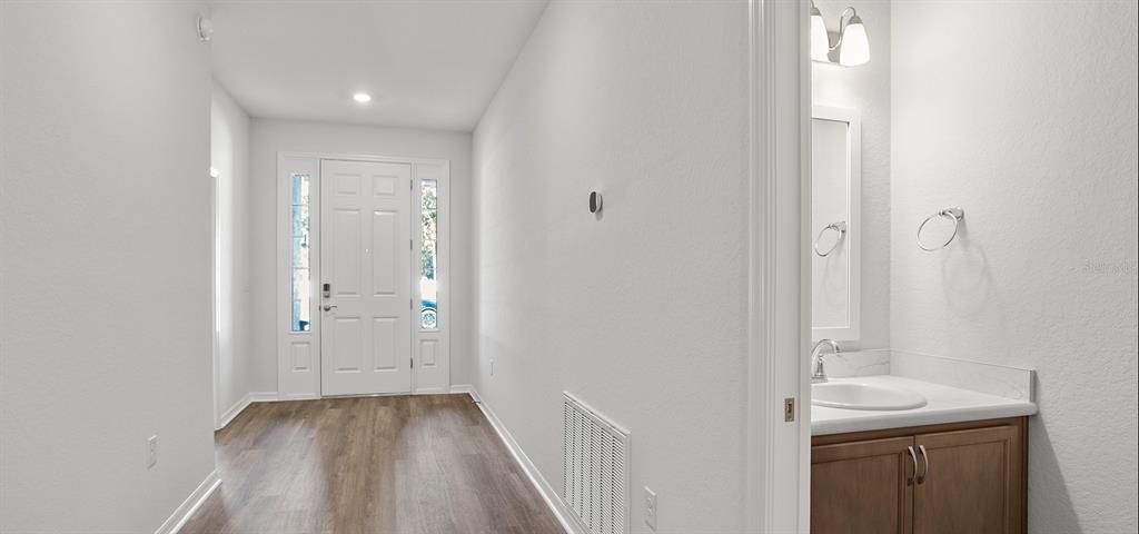 7550 Southwest 107th Lane Ocala, FL 34476 - Photo 13 of 22 a bathroom with a sink a toilet and shower