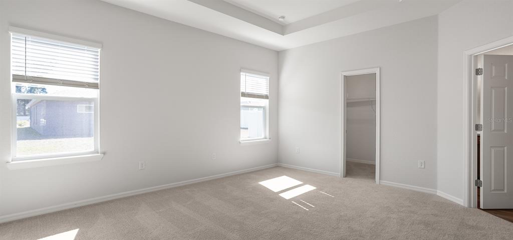 7550 Southwest 107th Lane Ocala, FL 34476 - Photo 20 of 22 an empty room with windows