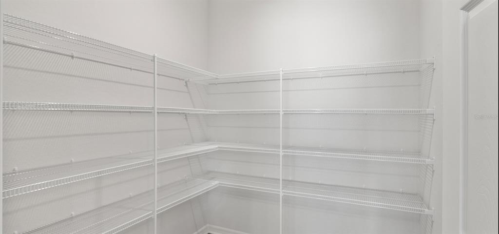 7550 Southwest 107th Lane Ocala, FL 34476 - Photo 21 of 22 a view of a room with empty racks