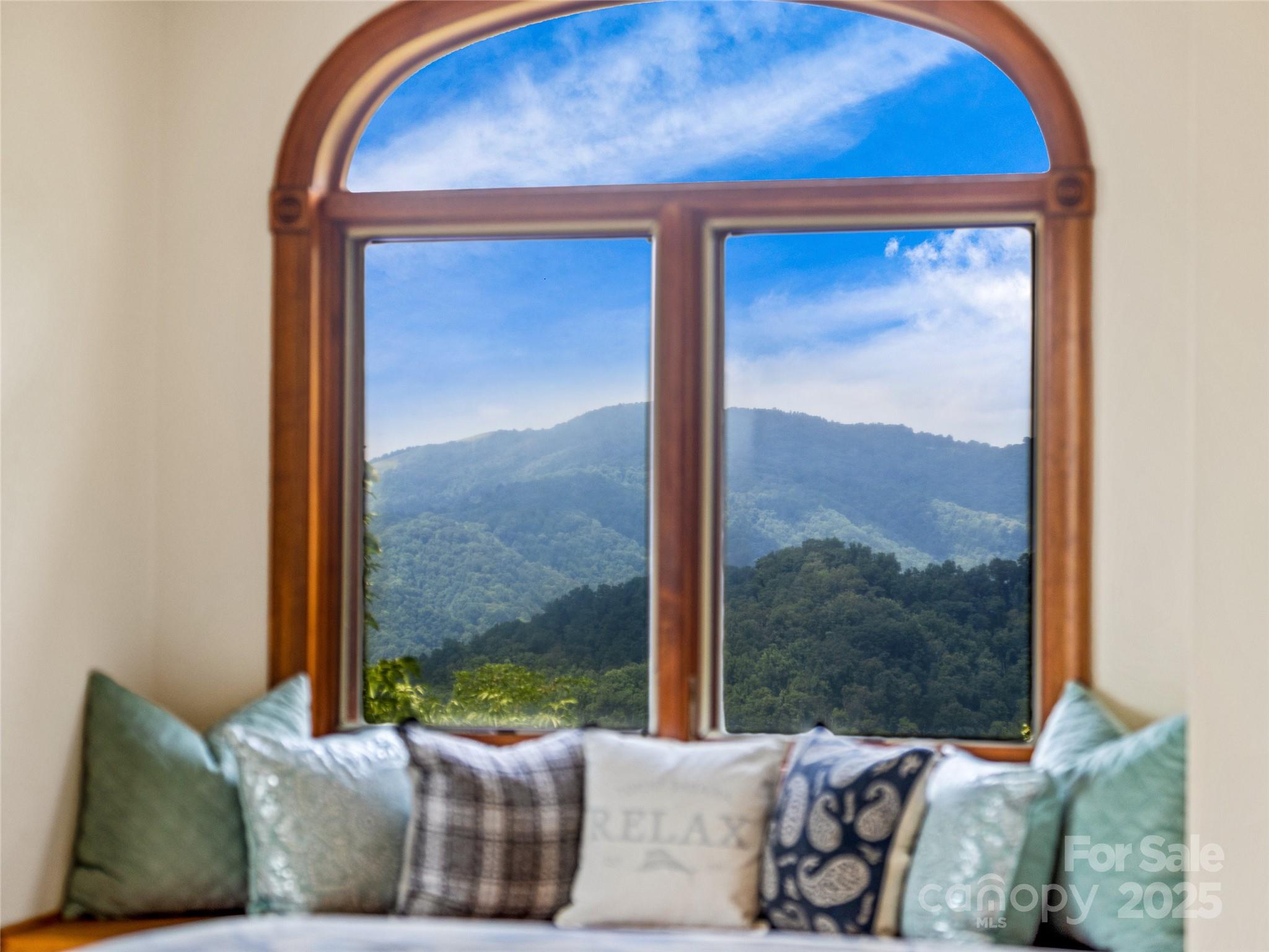 514 Lab Mountain Trail Clyde, NC 28721 - Photo 16 of 37 a living room with a large window
