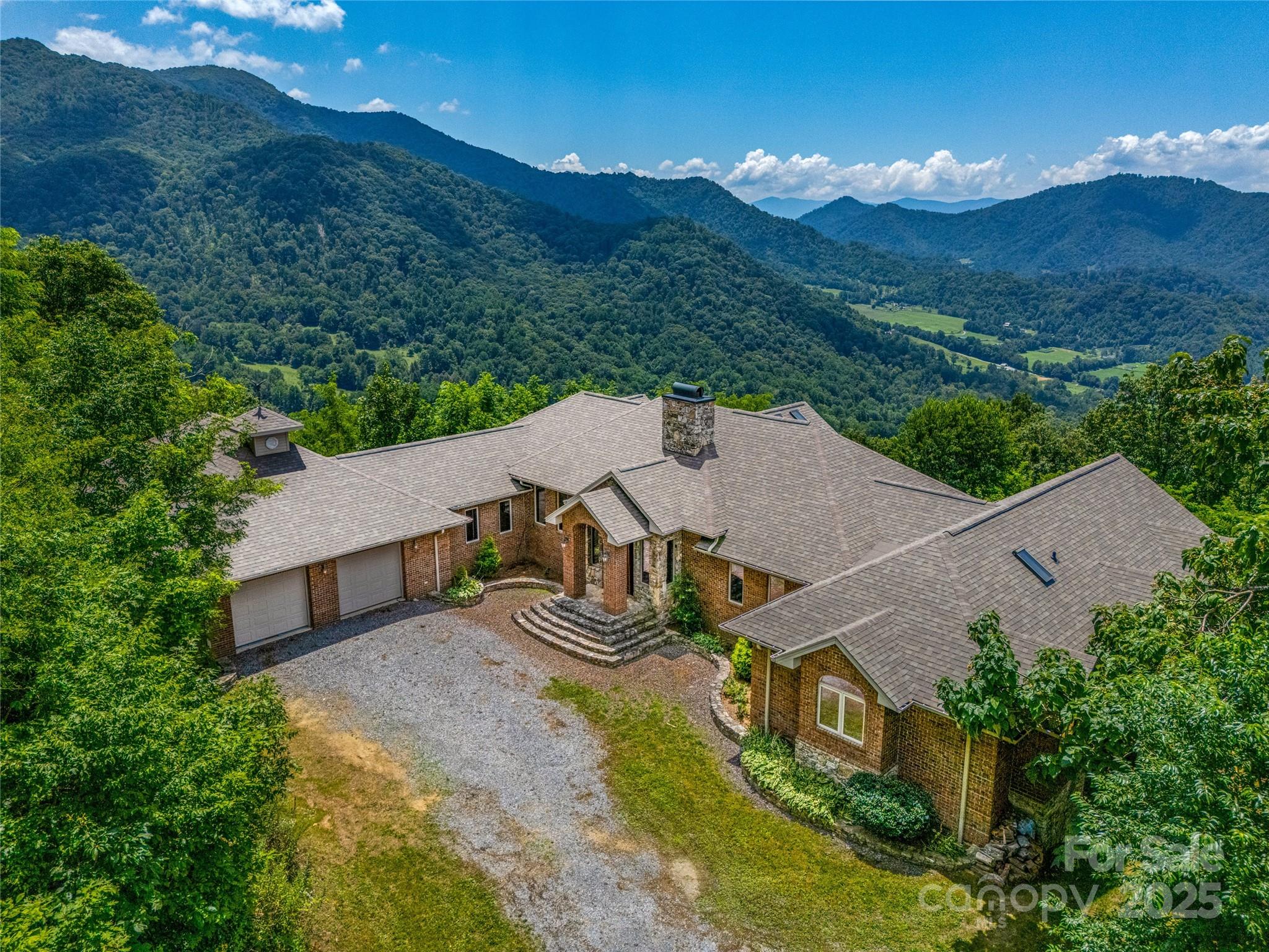 514 Lab Mountain Trail Clyde, NC 28721 - Photo 2 of 37 an aerial view of a house