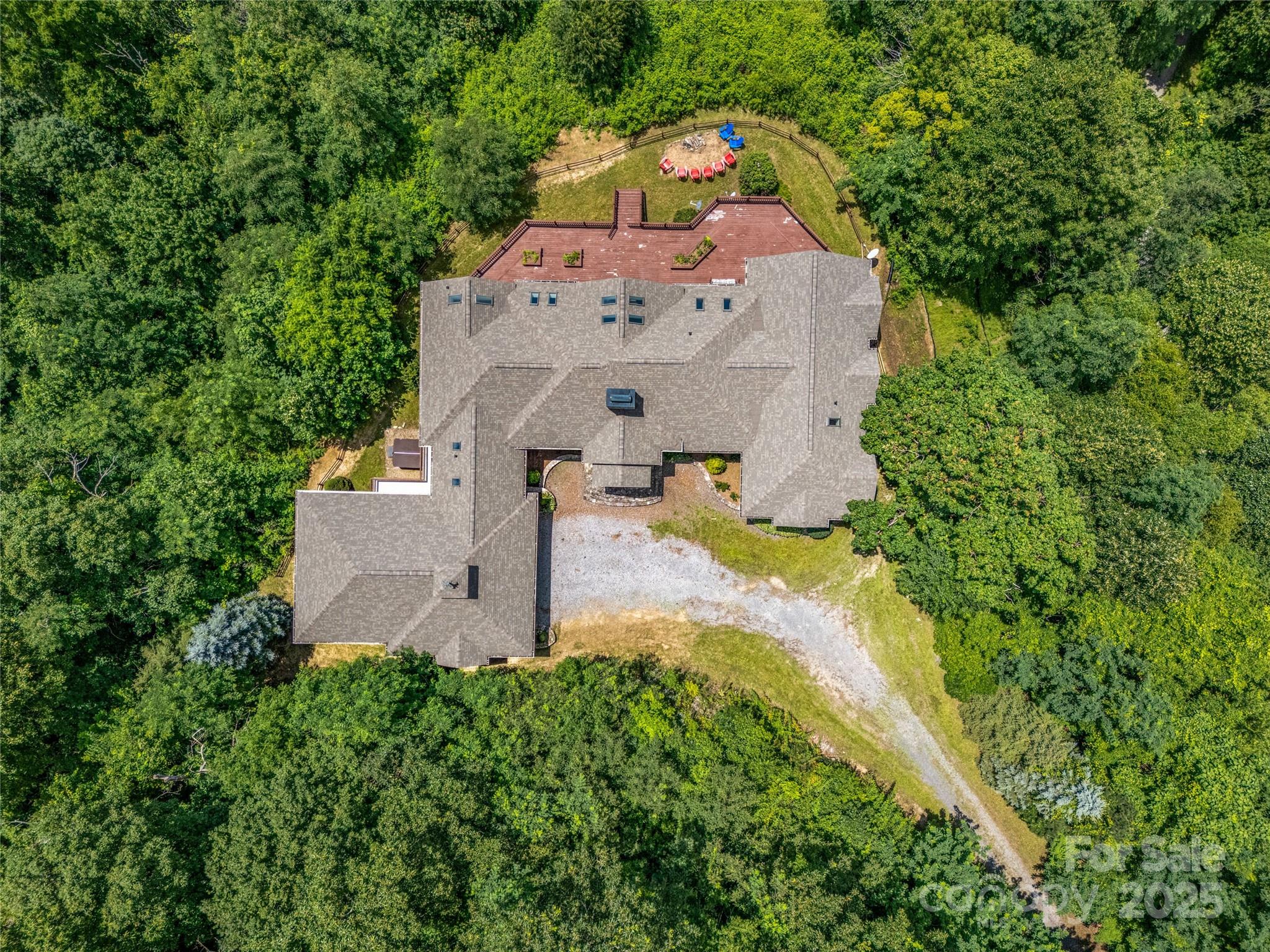 514 Lab Mountain Trail Clyde, NC 28721 - Photo 8 of 37 an aerial view of a house with yard swimming pool and outdoor seating