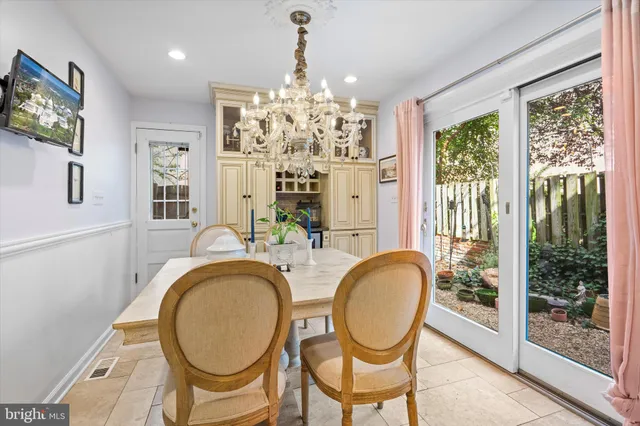 a outdoor living space with patio furniture and a fireplace