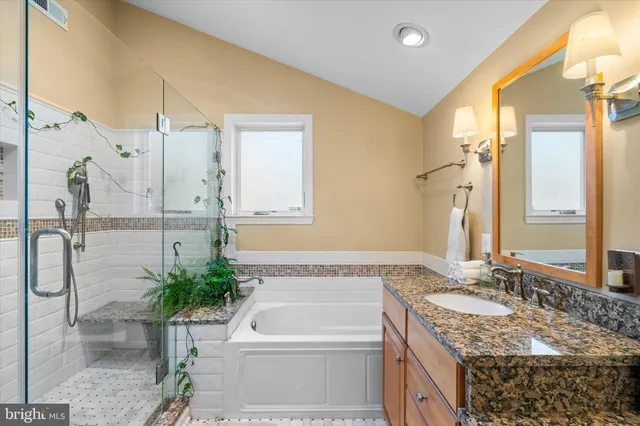 a view of a dining room with furniture chandelier and a chandelier