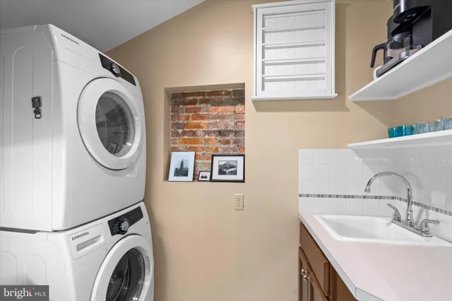 a room with furniture a couch and dresser