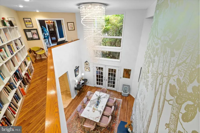 a bed room with a bed and a television