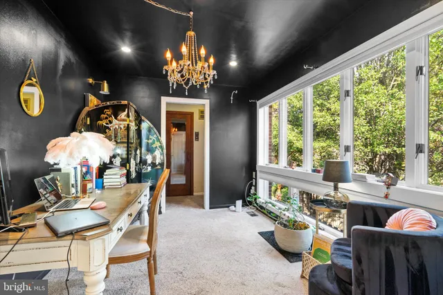 a living room with a couch and a table