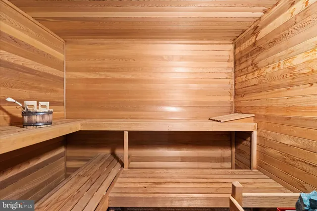 a view of a patio with table and chairs and potted plants