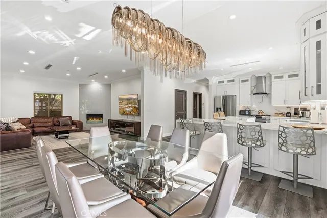 a bedroom with a bed and a mirror