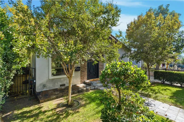 a house with trees in front of it