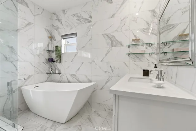 a bathroom with a sink and a shower