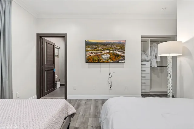 a kitchen with stainless steel appliances a refrigerator and a stove top oven