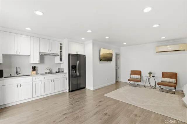 a lobby with furniture and a rug