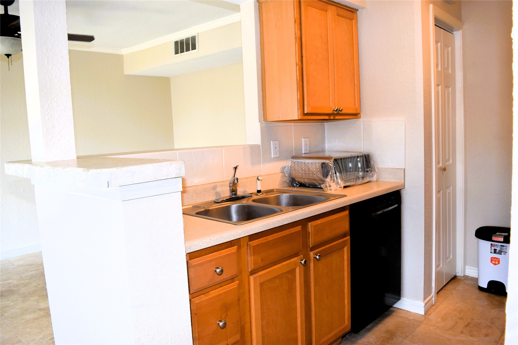 4011 NASA Road 1, Unit 406 Seabrook, TX 77586 - Photo 5 of 17 a kitchen with sink and cabinets