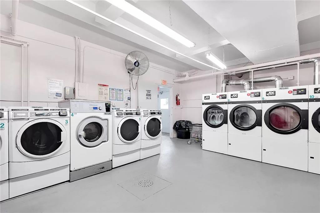 9511 Shore Road, Unit 313 Brooklyn, NY 11209 - Photo 10 of 11 a utility room with dryer and washer