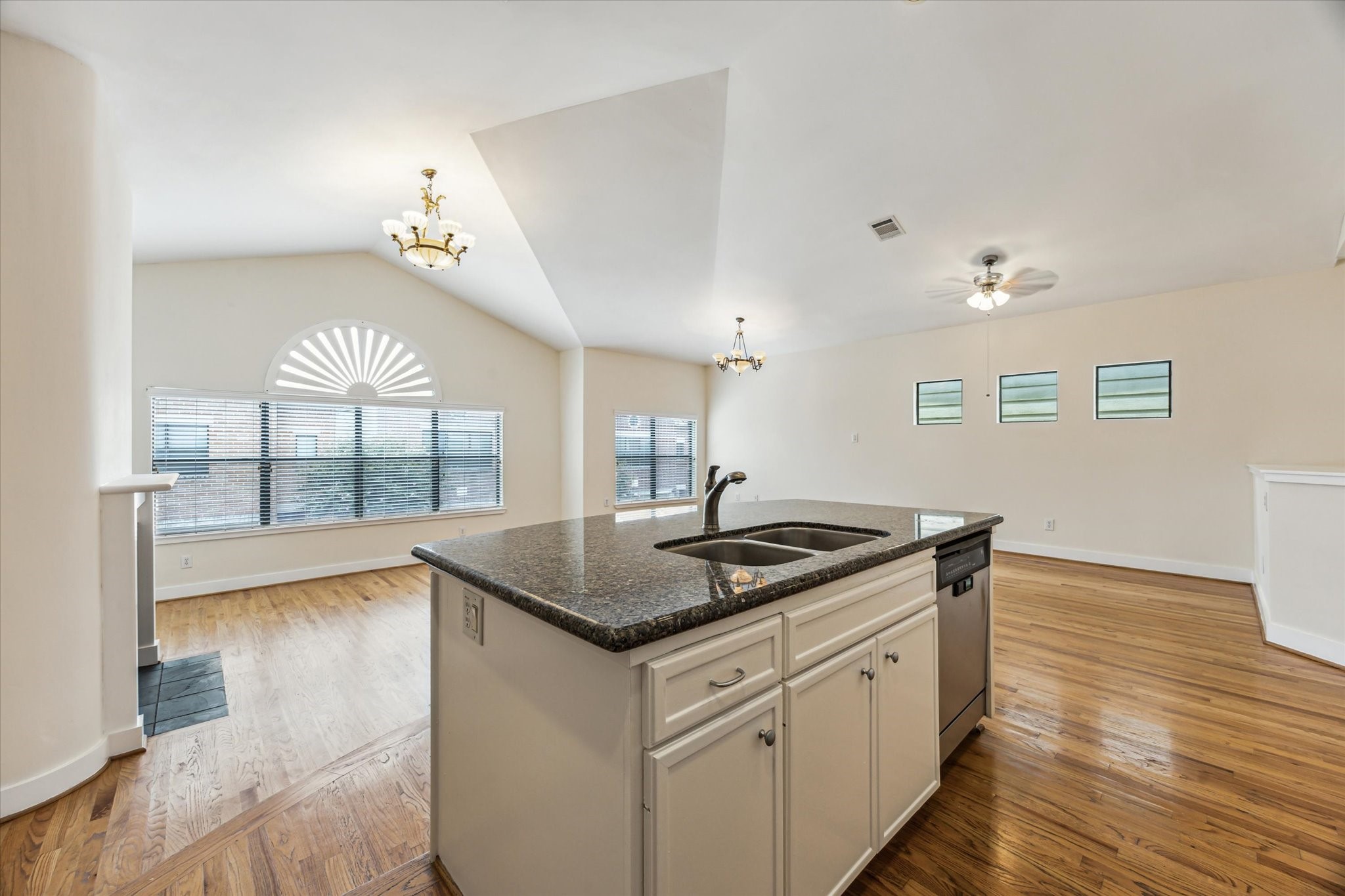 9829 Riddlelink Lane Houston, TX 77025 - Photo 7 of 22 Open sightlines from the kitchen to living areas for effortless daily living and entertaining.