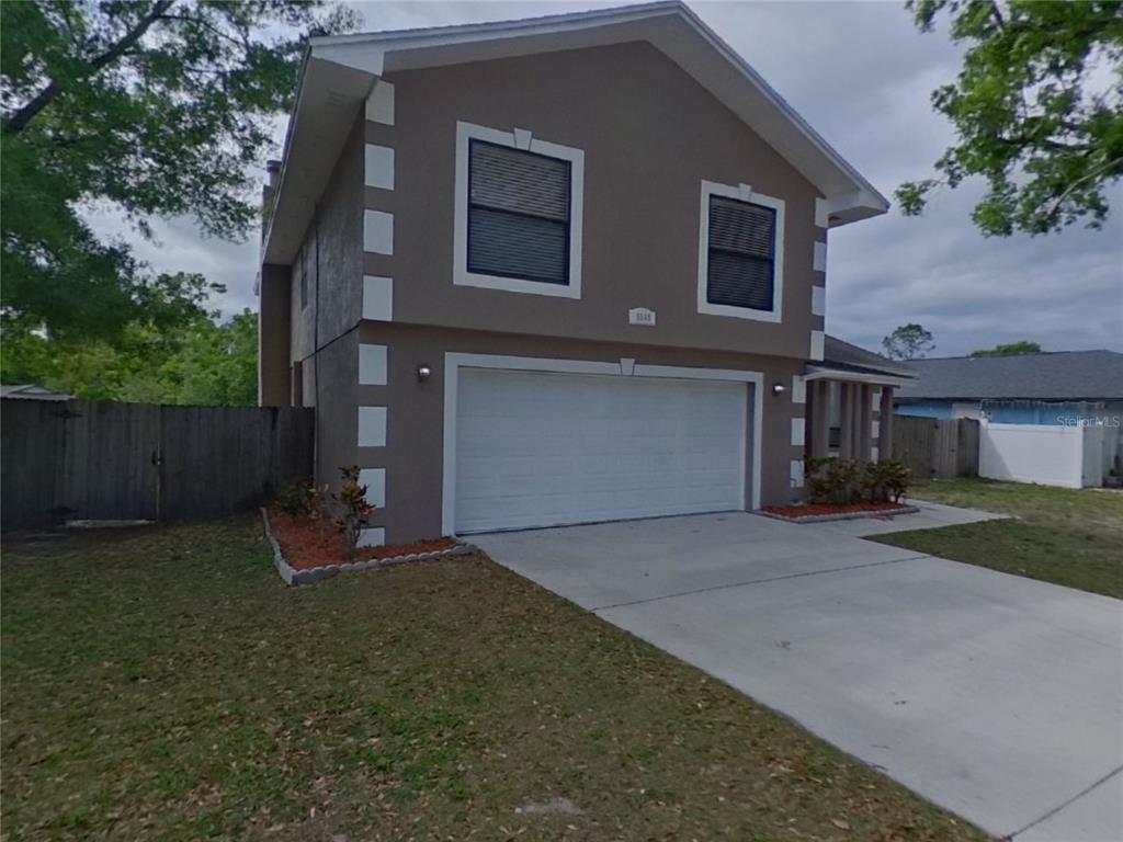 5569 Pentail Circle Tampa, FL 33625 - Photo 1 of 1 a front view of a house with garden