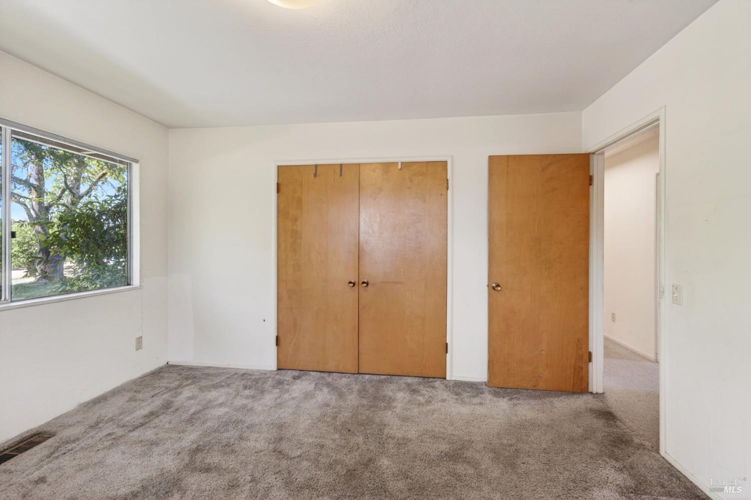 2062 Laguna Road Santa Rosa, CA 95401 - Photo 23 of 80 a view of an empty room and window