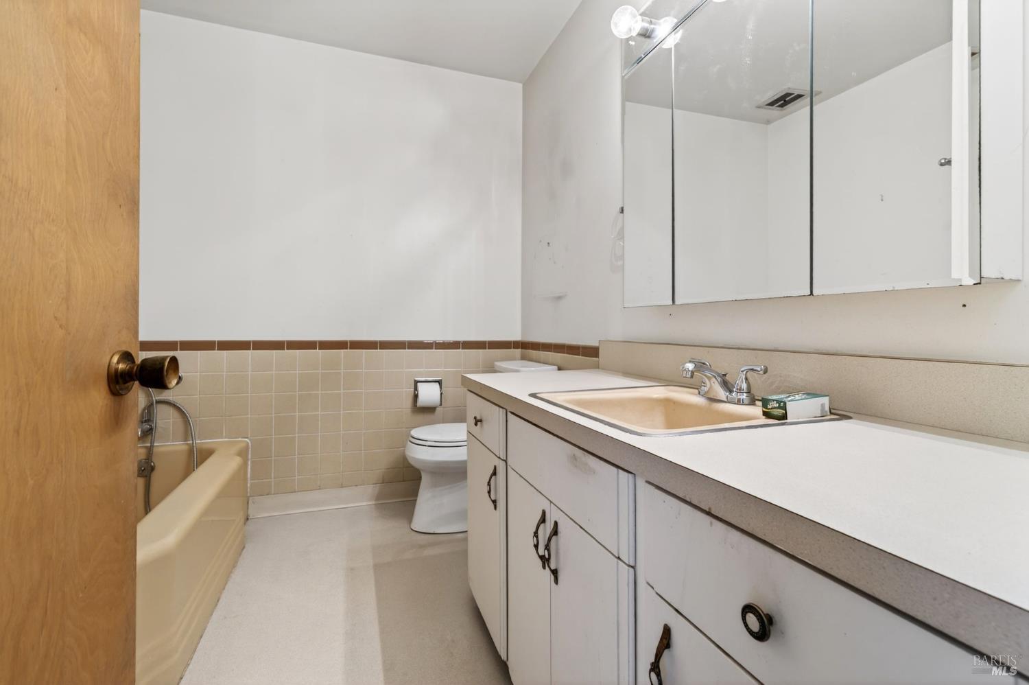 2062 Laguna Road Santa Rosa, CA 95401 - Photo 26 of 80 a bathroom with a sink and a toilet