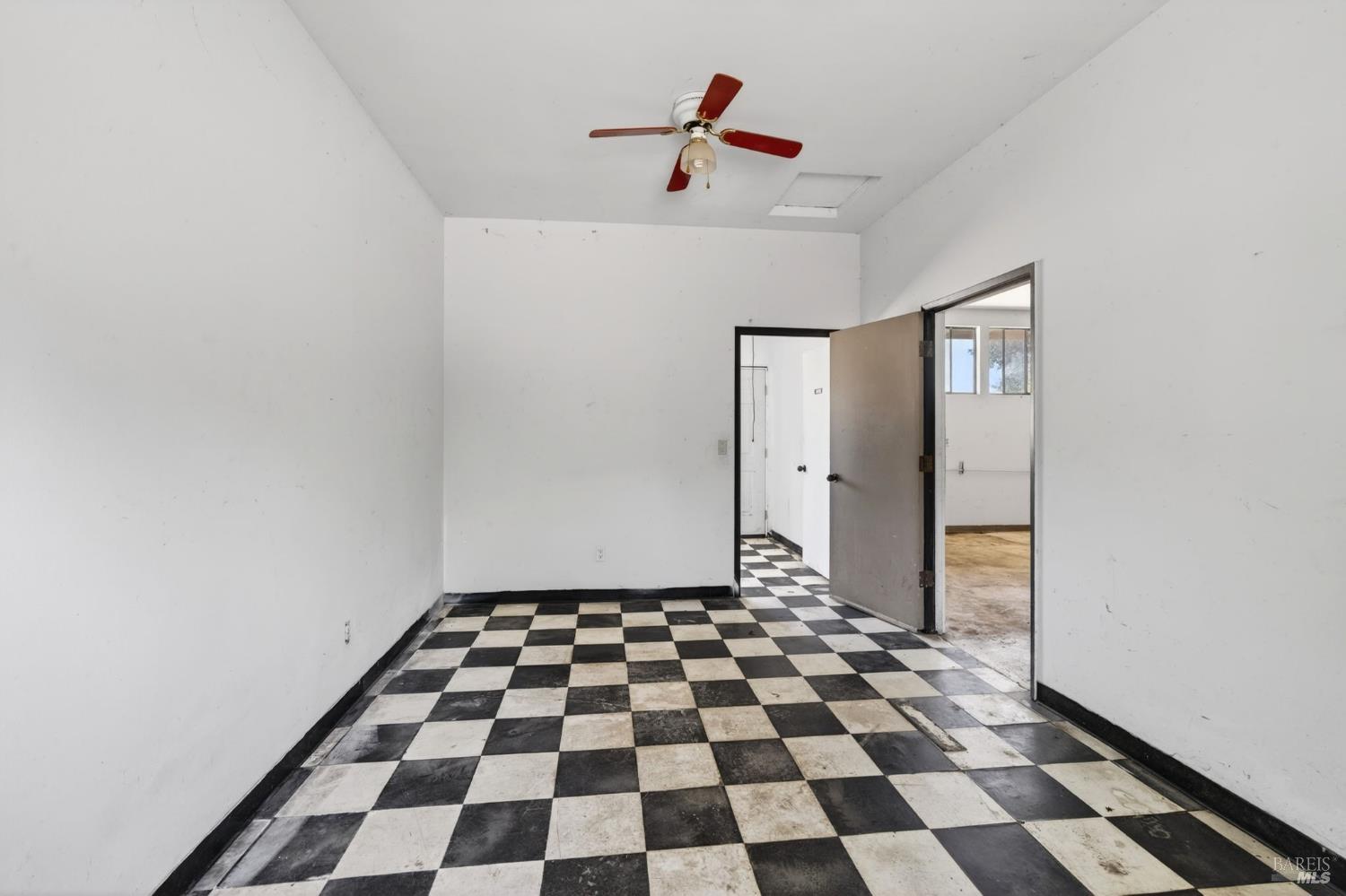 2062 Laguna Road Santa Rosa, CA 95401 - Photo 73 of 80 a view of a big room with a black and white checkered floor