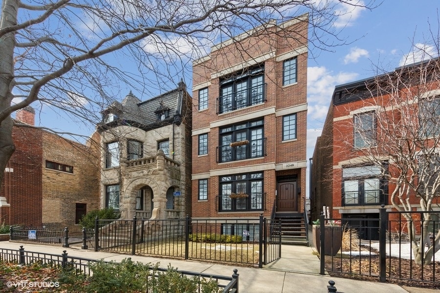 a front view of a house with glass windows