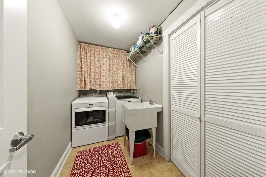 2248 North Racine Avenue, Unit 1 Chicago, IL 60614 - Photo 17 of 27 a view of utility room with washer and dryer
